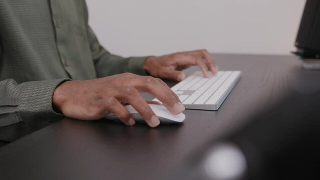 4K African American Business Man Typing on Keyboard and Working at Desktop Computer