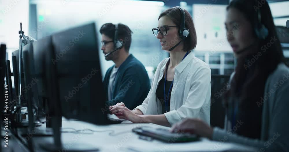 Fototapete Help Desk Specialist Having a Conversation on a Call, Providing Technical Support to Client Experiencing Computer Hardware and Software Issues. Female Using a Headset to Talk with a Tech Team