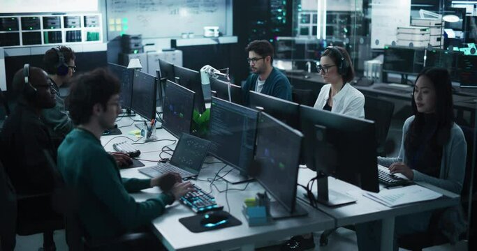 Team of Six Diverse Multiethnic Software Developers Working on Computers, Programming Advanced Code, Managing Artificial Intelligence Projects Online for Innovative Internet Based Blockchain
