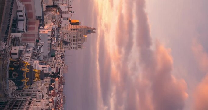 Madrid Gran Via Skyline during cloudy sunset timelapse day to  night vertical smartphone ready