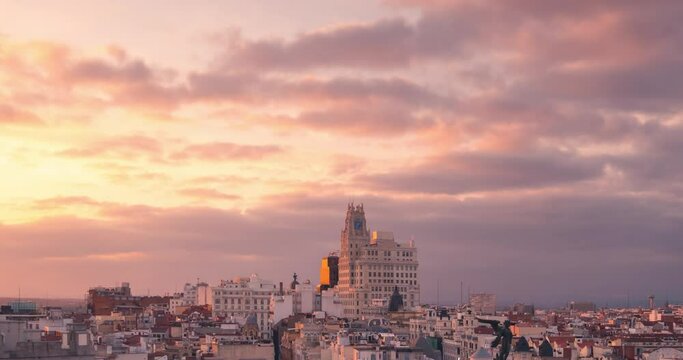 Madrid Gran Via Skyline during cloudy sunset timelapse day to  night copy space at the top