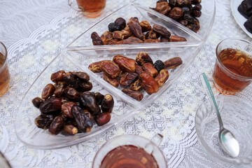 Dates fruits and hot tea. Food to break fast during holy month of Ramadan.