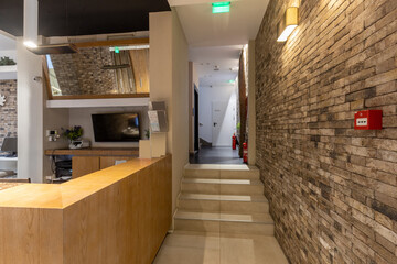 Hotel lobby with decorated stone wall