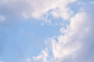 Obraz premium Background of blue sky with white clouds