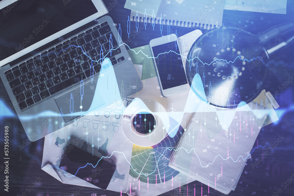Poster Financial market graph and top view computer on the desktop background. Multi exposure. Investment concept.