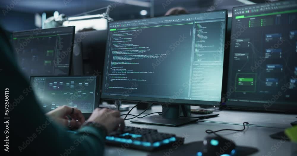 Leinwandbilder Close Up of a Software Developer Working on a Desktop Computer, Programming Code Running on Display. Specialist Typing on Keyboard, Coding and Implementing a Technical Feature. Static Footage