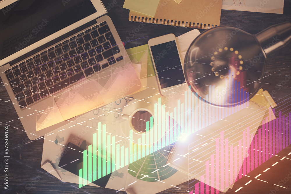Poster financial market graph and top view computer on the desktop background. multi exposure. investment c