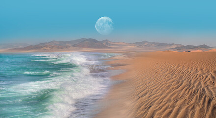 Namib desert with Atlantic ocean meets near Skeleton coast with full moon - Namibia, South Africa...