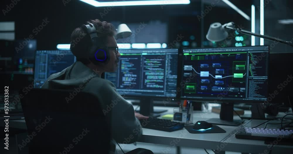 Poster Young Hacker Working Alone, Hacking Corporate Data Servers From His Underground Hideout. Hacktivist Organizes a Massive Data Breach Cyber Attack, Hiding His Identity Behind Multiple Proxy Servers