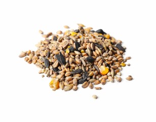 Pile of different vegetable seeds on white background