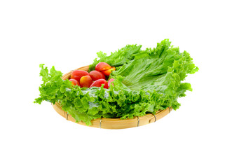 Obraz na płótnie Canvas fresh lettuce leaves and tomatoes in basket isolated on transparent png