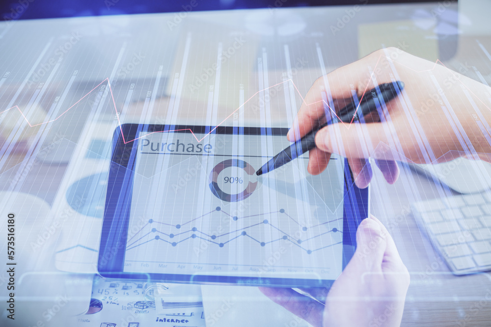 Poster double exposure of man's hands holding and using a phone and financial chart drawing. market analysi