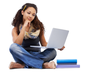 A Hispanic young college student looking at a laptop and reading e-books for university education and making internet research and online notes on a tech device isolated on a png background.