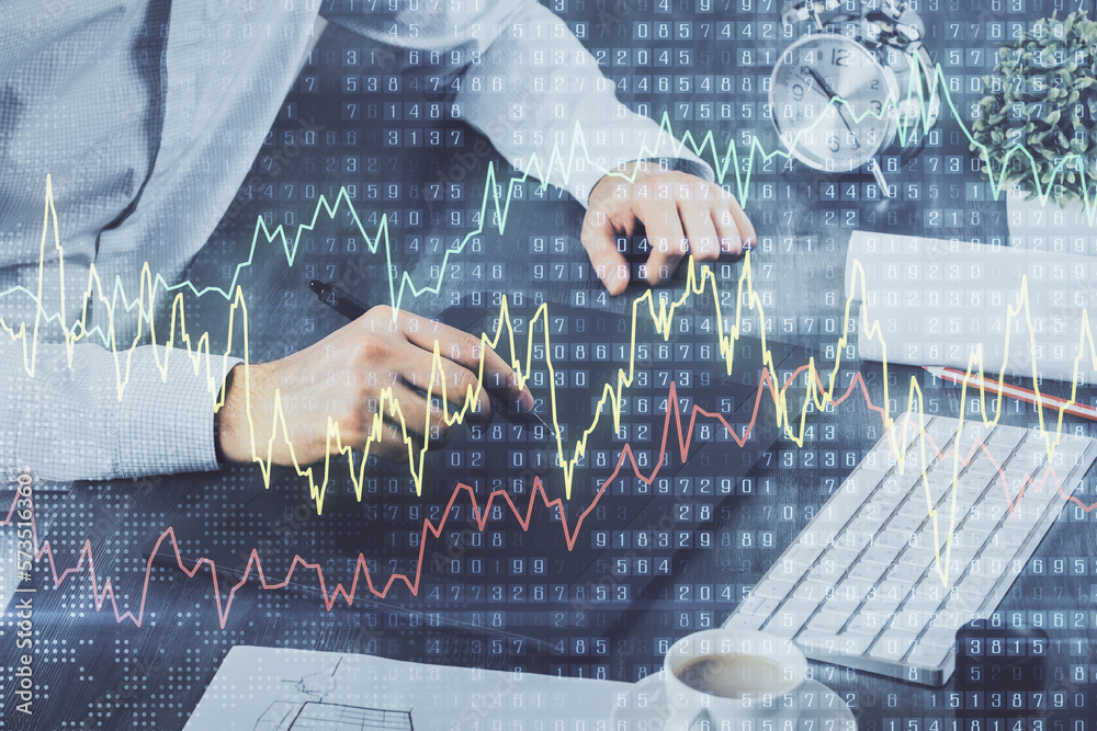 Poster double exposure of man's hands holding and using a phone and financial graph drawing. analysis conce