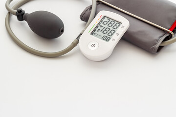 Medical device tonometer for blood pressure and heart rate on white background.
