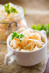 Sauerkraut with carrots and spices in a bowl