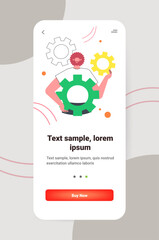 businessman holding colorful cogwheels business process successful project creation concept vertical