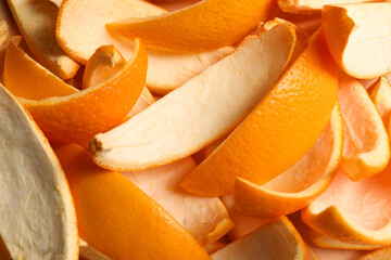 Many orange peels preparing for drying as background, closeup