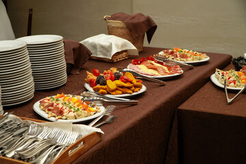 appetizers. platters of appetizers placed on a table at an event.