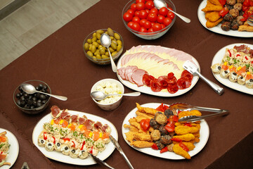 appetizers. platters of appetizers placed on a table at an event.