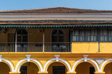 Exterior facade of the old colonial era Mint House building built in 1834 in the Latin quarter of Panjim. - obrazy, fototapety, plakaty