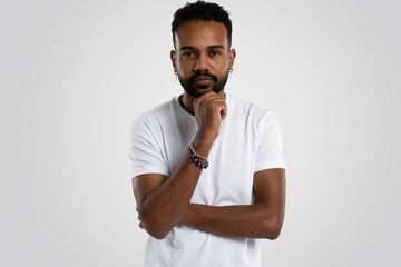 Obraz premium Handsome young african american guy posing in studio - isolated