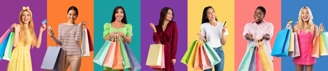 Smiling international young ladies hold many packages with purchases and credit card, enjoy shopping