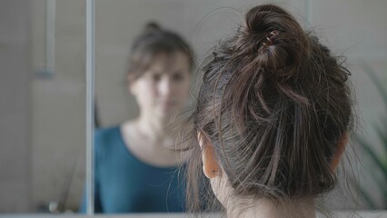 Portrait of woman face reflect in mirror, insight reflection, passing youth