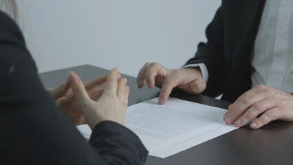 Detail of business man hand explaining, face to face negotiation