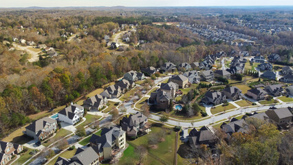 Aerial view suburban residential neighborhood with Chestnut Mountain in distance background near Atlanta, Georgia, USA