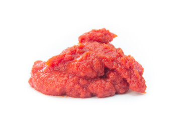 Tomato paste isolated on a white background. Closeup photo.