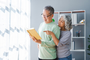 Elderly couple asian people grandfather and grandmother living together in retirement Concept of elderly health and health insurance.