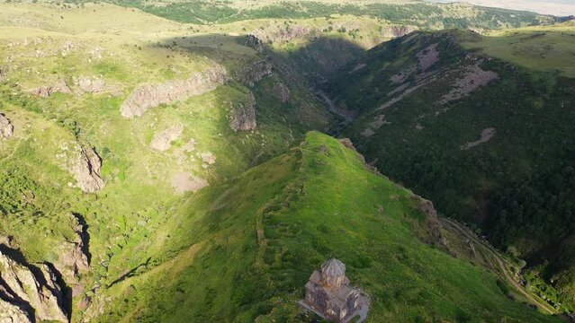 Aerial view over Church of Vagramashen on slope of Mount Aragats in Armenia. Travel attractions  in Armenia.