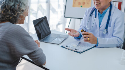 Elderly medical asian people with patient, Physical check-ups and encouragement for treatment of rheumatism and cancer The concept of health insurance for the elderly and health care