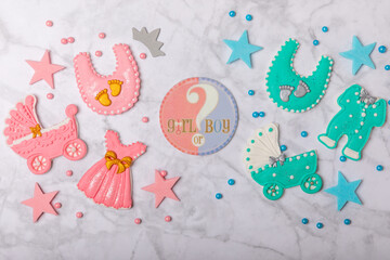 Baby shower cookies on a marble background. Gender cookies. Candy bar holiday baby shower party. Gender party. Holiday concept.