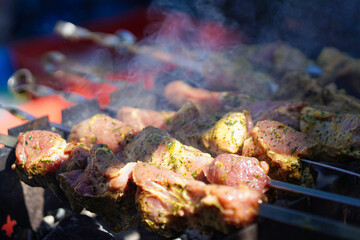  Summer barbecue cooking. Shashlik or shish kebab preparing on barbecue grill
