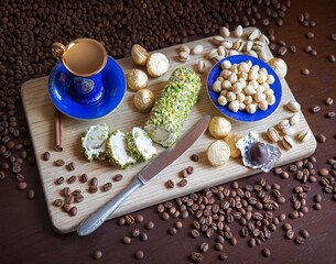 Sweets on the background of coffee on the table