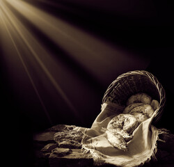 Five loaves and two fish in a basket