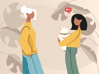 two girls against the background of plants, there is a mother and a daughter next to her with a dog in her hands.