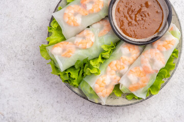 Vietnamse spring summer rolls with shrimp, lettuce, mint and vegetables