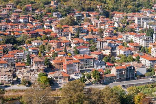 View of the city from above. The tiled roofs of the houses. Quality image for your project