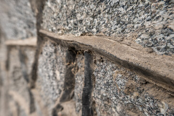 stone wall in selective focus