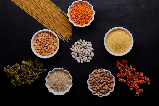 Low fodmap diet, long carbohydrates. Aesthetic set of cereals and gluten free pasta background