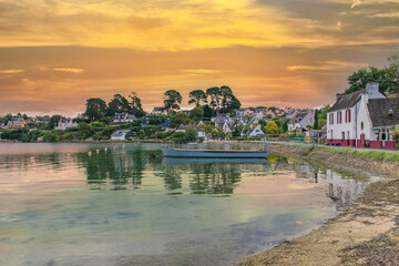Brittany, Ile aux Moines island in the Morbihan gulf, the typical harbor in summer, sunset
