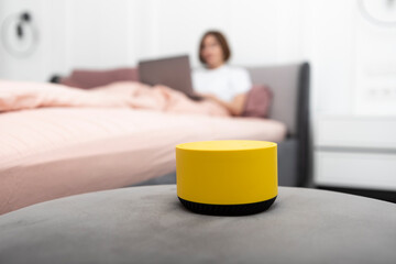 Close up photo of smart speaker able to manage home in wireless way