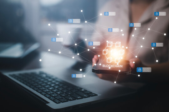 Handhold smartphone and laptop with Blockchain financial technology network concept, Digital money to bitcoin for online payments and money transactions, Fintech concept with block cryptography,