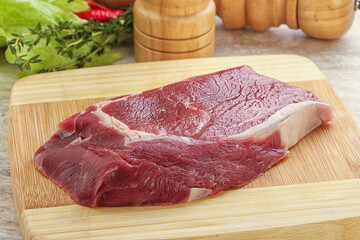 Raw rib-eye beef steak black angus
