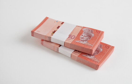 Bundle of Ringgit Malaysia bank note on white background. Malaysia Currency Ringgit RM50