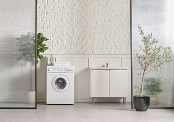 Washing machine in the bathroom, white brick wall background, vase of plant, cabinet and marble floor, folding screen.