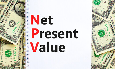 NPV net present value symbol. Concept words NPV net present value on white note on a beautiful...